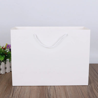 Biała torba na zakupy z papieru pakowego o gramaturze 100g / m2 Niestandardowe logo